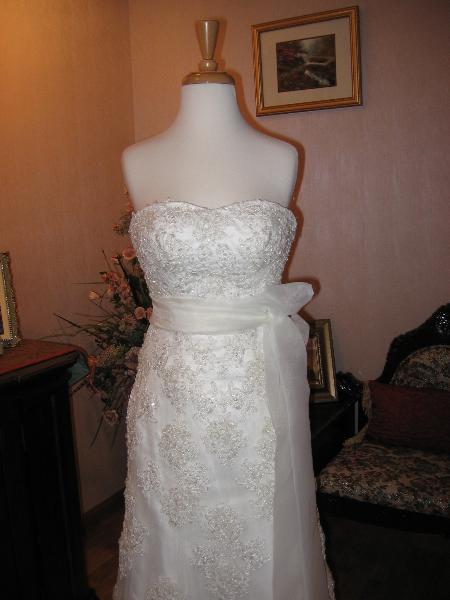 Wedding dress alterations, over bustle by Bridal Alterations by Ruth