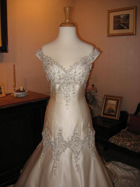 Wedding dress alterations, over bustle by Bridal Alterations by Ruth
