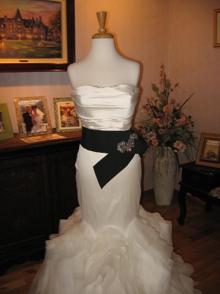 Wedding dress alterations, over bustle by Bridal Alterations by Ruth