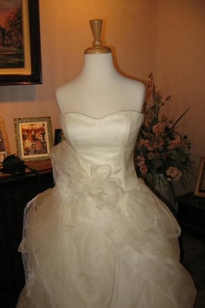 Wedding dress alterations, over bustle by Bridal Alterations by Ruth