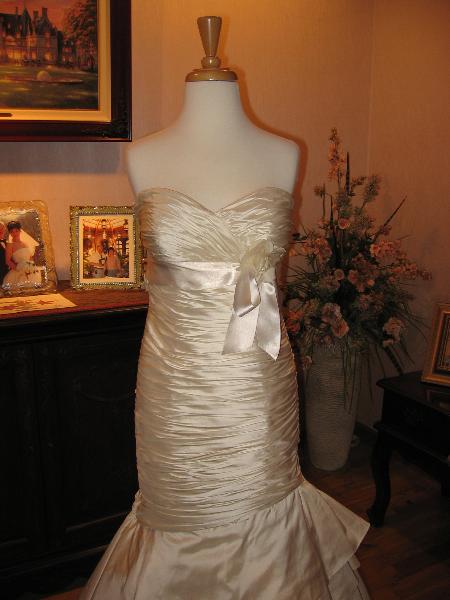 Wedding dress alterations, over bustle by Bridal Alterations by Ruth