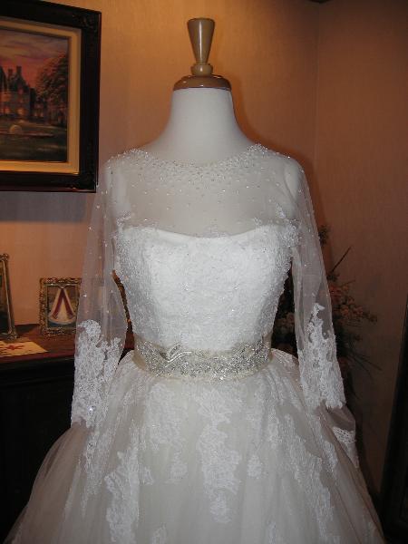 Wedding dress alterations, over bustle by Bridal Alterations by Ruth