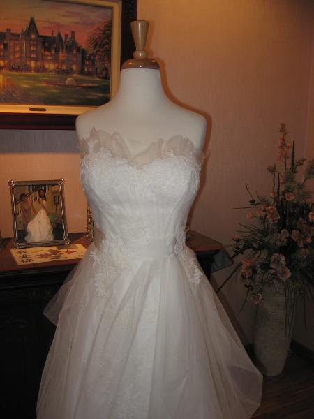 Wedding dress alterations, over bustle by Bridal Alterations by Ruth