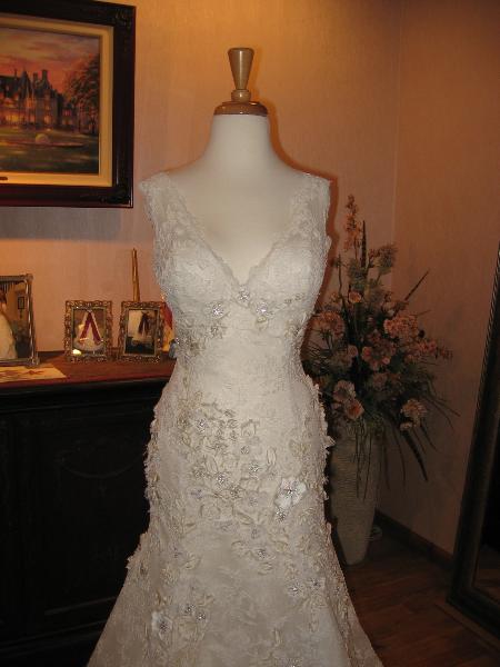 Wedding dress alterations, over bustle by Bridal Alterations by Ruth