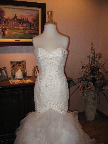 Wedding dress alterations, over bustle by Bridal Alterations by Ruth